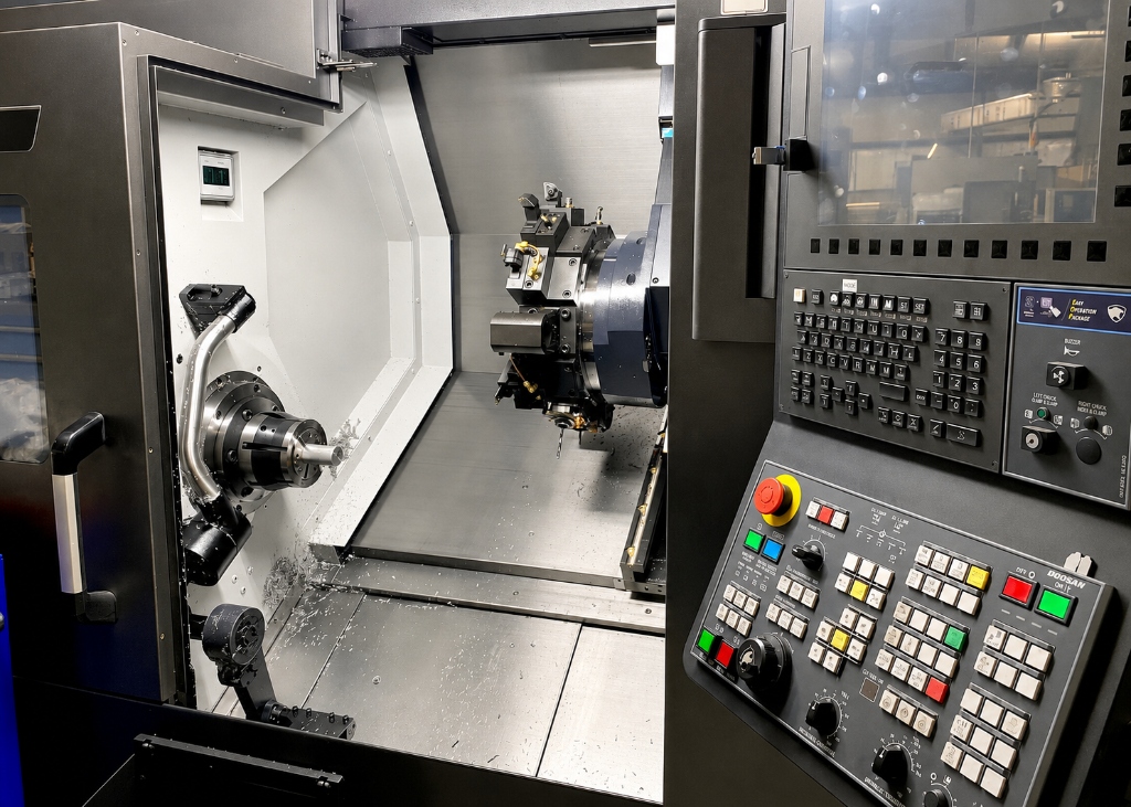 Doosan multi-axis CNC machine interior and control panel